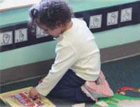 Child working on a puzzle