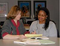 Photo of a teacher advising a student