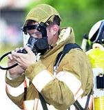 photo of student testing full-face respirator