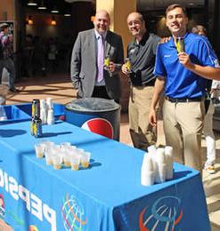 Pepsi representative handing out samples