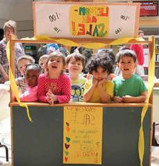 little kids running a lemonade stand