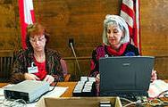 paralegal and judge reviewing evidence